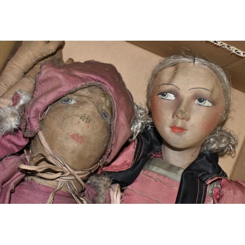 517 - A VINTAGE CLOTH HEAD DOLL, moulded and painted features, original wig, cloth body with composition l... 