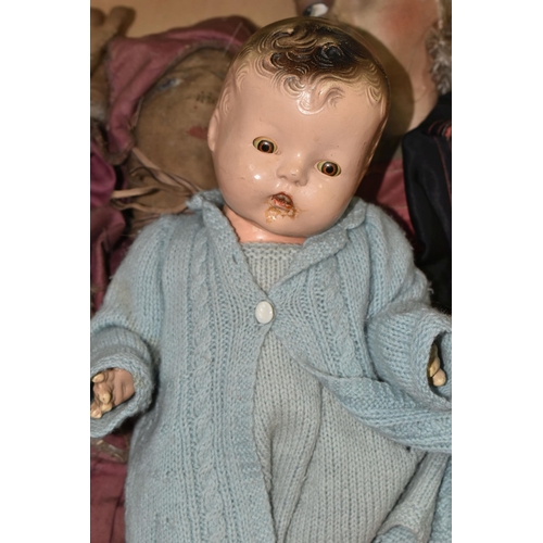 517 - A VINTAGE CLOTH HEAD DOLL, moulded and painted features, original wig, cloth body with composition l... 