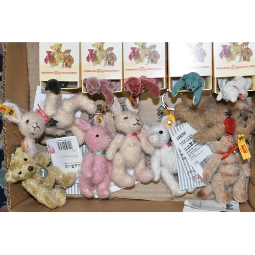 531 - A BOX CONTAINING SEVEN STEIFF KEYRINGS AND FIVE BOXED MINIATURE HERMANN TEDDY BEARS, the Steiff comp... 