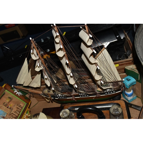 547 - TWO BOXES AND LOOSE ASSORTED SUNDRY ITEMS ETC, to include a ship in a bottle, a wooden model of a sh... 