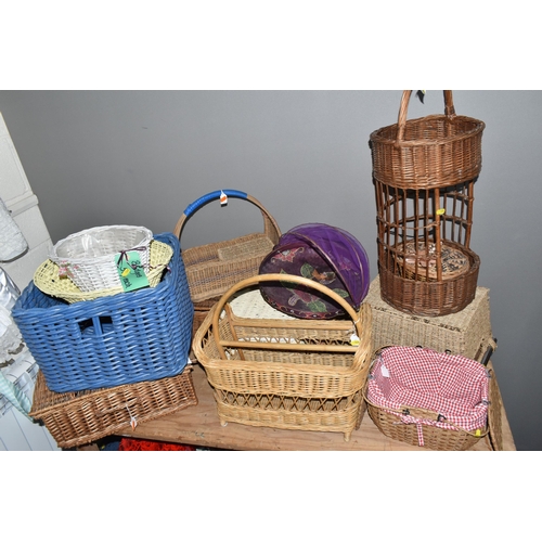 549 - A QUANTITY OF WICKER BASKETS AND FLORAL STORAGE BOXES, com prising wicker picnic hampers, shopping b... 