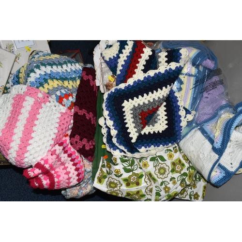 551 - FOUR BOXES OF VINTAGE BED THROWS AND TABLE LINEN, to include a large quantity of handmade crochet th... 