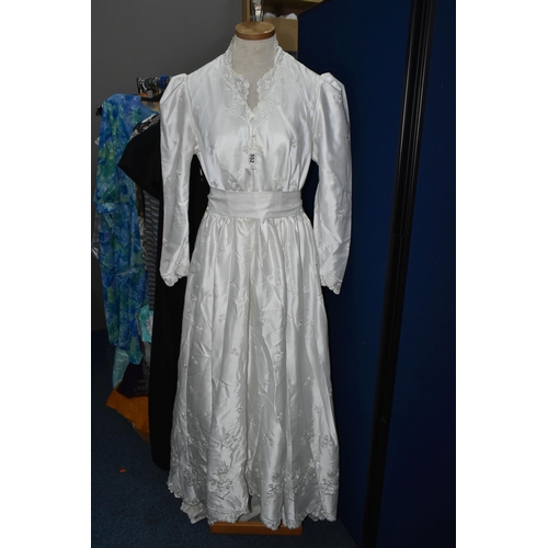 552 - TWO BOXES, SUITCASE AND LOOSE VINTAGE CLOTHING, to include a 1980's Pronuptia wedding dress, long sl... 