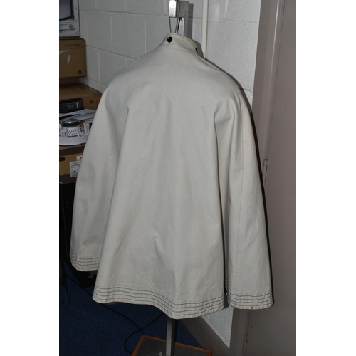 553 - AN ICONIC VINTAGE 1960'S MARY QUANT 'ALLIGATOR' CAPE, one size fits all ivory coloured cape, 100% co... 