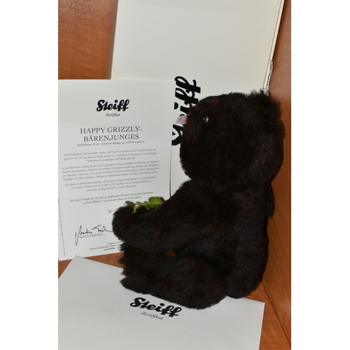 606 - A BOXED STEIFF LIMITED EDITION 'HAPPY GRIZZLY BEAR CUB', no.036545, ltd ed no. 236/2009, dark brown ... 