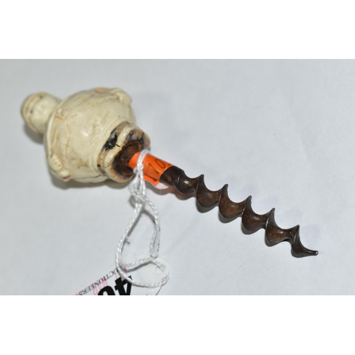 400 - A 1920S NOVELTY CORKSCREW, the celluloid handle in the form of a 'Jolly Huntsman', height of figure ... 