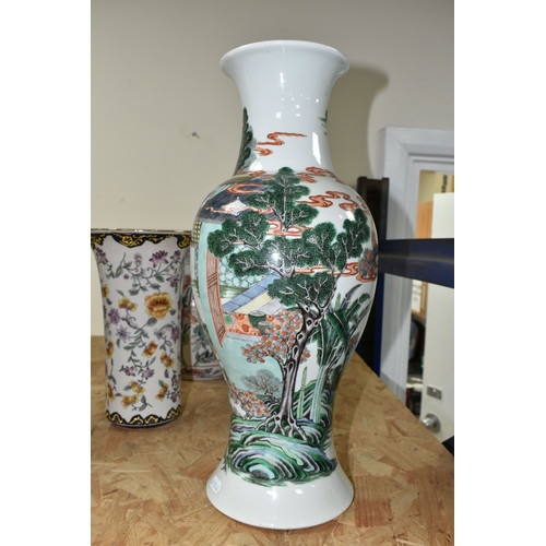 438 - A 19TH CENTURY CHINESE FAMILLE VERT BALUSTER VASE, enamelled with a continuous scene of figures in b... 