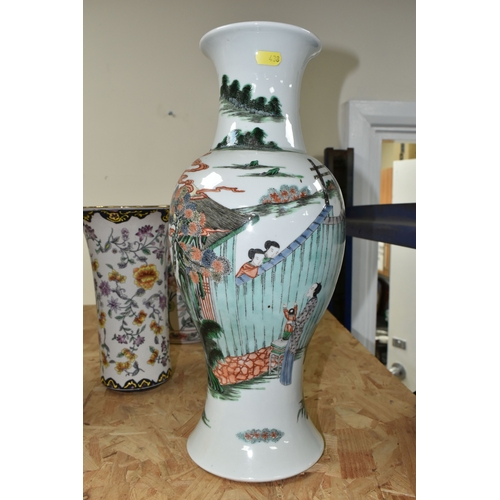 438 - A 19TH CENTURY CHINESE FAMILLE VERT BALUSTER VASE, enamelled with a continuous scene of figures in b... 