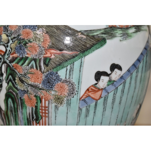 438 - A 19TH CENTURY CHINESE FAMILLE VERT BALUSTER VASE, enamelled with a continuous scene of figures in b... 