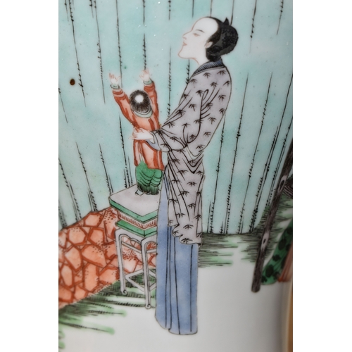 438 - A 19TH CENTURY CHINESE FAMILLE VERT BALUSTER VASE, enamelled with a continuous scene of figures in b... 