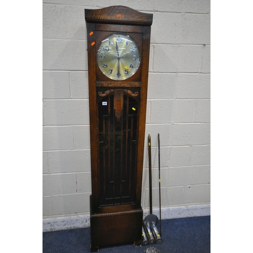 1297 - AN EARLY TO MID 20TH CENTURY OAK LONGCASE CLOCK, the full length door enclosing a 11 inch dial, heig... 