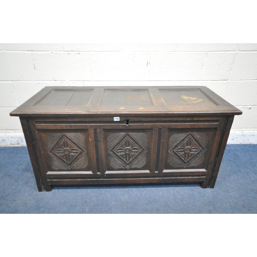 1298 - A GEORGIAN OAK PANELLED COFFER, with carved diamonds, width 130cm x depth 55cm x height 60cm (condit... 