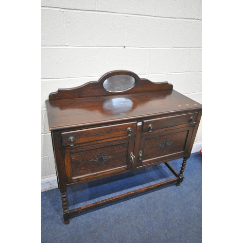 1299 - AN OAK SIDEBOARD, with a raised back, two drawers, and double cupboard doors, width 120cm x depth 44... 