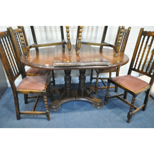 1301 - A OAK TWIN PEDESTAL DINING TABLE, with two additional leaves, extended length 212cm x closed length ... 