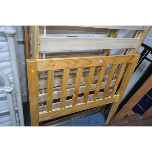 1304 - A MODERN PINE SINGLE BEDSTEAD, with pull out guest bed (condition report: with bolts)