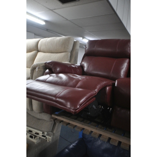 1306 - A RED LEATHER ELECTRIC THREE SEATER SOFA, with multiple buttons to recline, adjustable headrest, cen... 