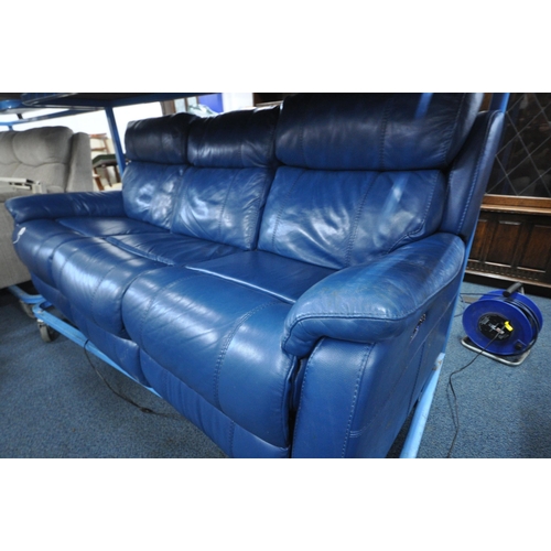 1307 - A BLUE LEATHER ELECTRIC THREE SEATER SOFA, with multiple buttons to recline, adjustable headrest, ce... 