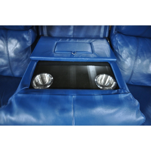 1307 - A BLUE LEATHER ELECTRIC THREE SEATER SOFA, with multiple buttons to recline, adjustable headrest, ce... 