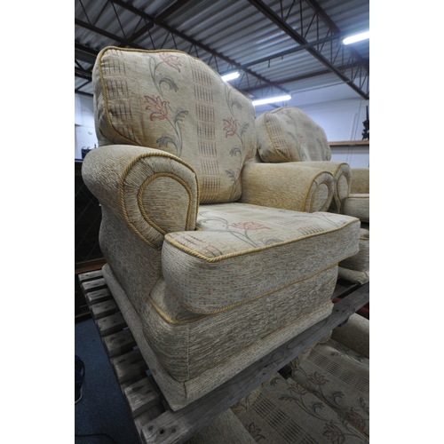 1308 - A FLORAL UPHOLSTERED THREE PIECE LOUNGE SUITE, comprising a three seater armchair, and a pair of arm... 