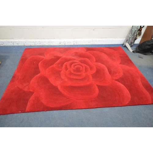 1309 - A UPHOLSTERED RUG OF A ROSE, 229cm x 162cm (condition report: in need of cleaning)