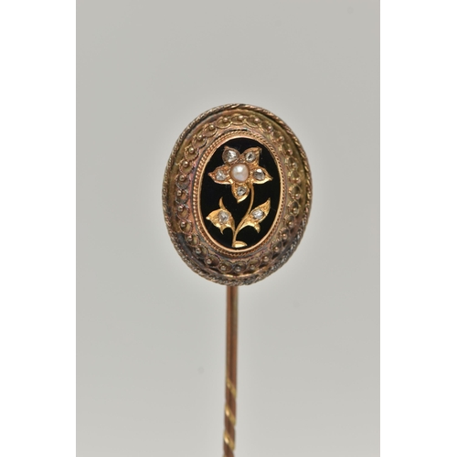 13 - A VICTORIAN CASED STICK PIN, yellow metal unmarked, oval Etruscan pin, decorated with a rose cut dia... 