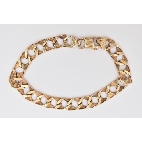 40 - A 9CT GOLD CURB LINK BRACELET, approximate width 8.2mm, square alternating textured and polished lin... 