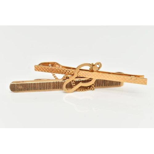 42 - TWO 9CT GOLD TIE CLIPS, the first with a textured pattern, hallmarked 9ct Birmingham, length 50mm, t... 