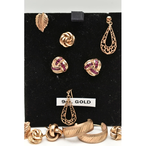 48 - A SELECTION OF YELLOW METAL EARRINGS, to include a boxed pair of studs set with rubies, post and scr... 