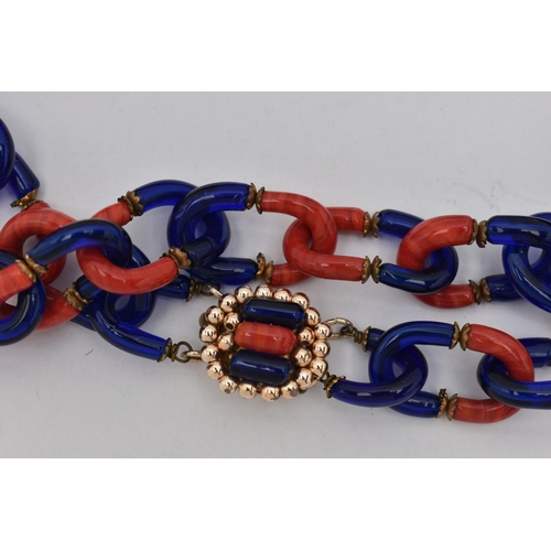 51 - A MID CENTURY ITALIAN GLASS NECKLACE, circa 1960, a red and blue glass necklace in the style of Arch... 