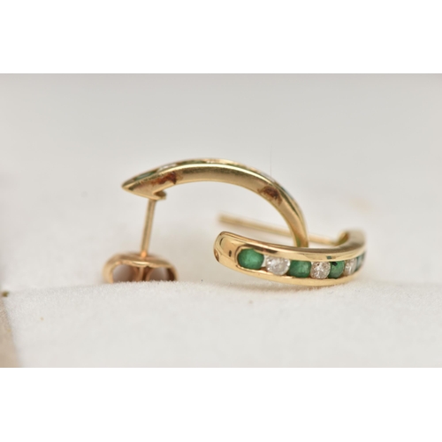 56 - A PAIR OF EMERALD AND DIAMOND EARRINGS, each designed as half hoops channel set with four brilliant ... 