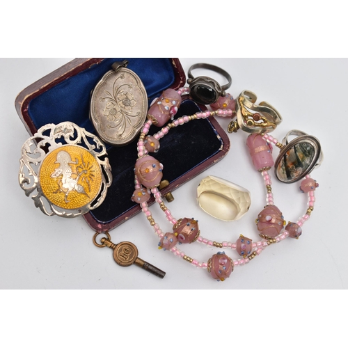 69 - A SELECTION OF SILVER AND WHITE METAL JEWELLERY, to include an enamel Siam brooch, a silver locket, ... 