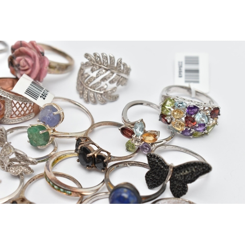 73 - A SELECTION OF WHITE METAL RINGS, various designs, some set with semi-precious gemstones, marks to i... 