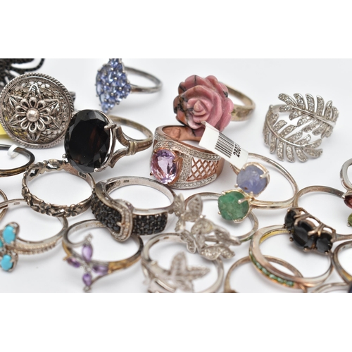 73 - A SELECTION OF WHITE METAL RINGS, various designs, some set with semi-precious gemstones, marks to i... 