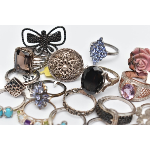 73 - A SELECTION OF WHITE METAL RINGS, various designs, some set with semi-precious gemstones, marks to i... 