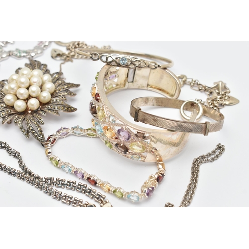 74 - ASSORTED WHITE METAL BRACELETS AND A BROOCH, to include a large multi gem set cuff bangle, set with ... 