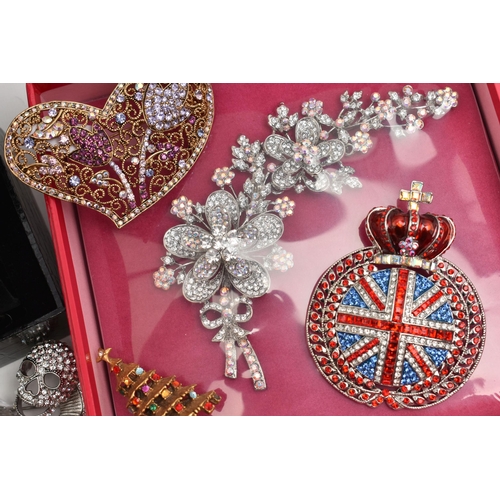 113 - A COLLECTION OF BUTLER AND WILSON JEWELLERY, to include a watch with case, a Union jack brooch, a he... 