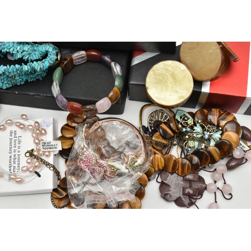 117 - A COLLECTION OF COSTUME AND GEM SET JEWELLERY, to include a Kirks Folly Man on the Moon bracelet, a ... 