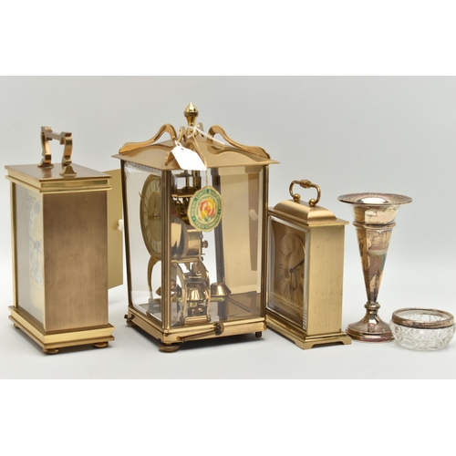 124 - A SILVER POSY VASE, SALT AND THREE CARRIAGE CLOCKS, tapered polished posy vase on a round weighted b... 