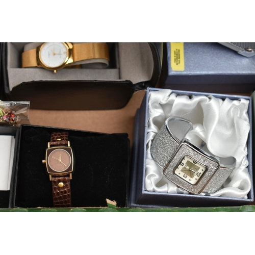 128 - A COLLECTION OF FASHION COSTUME WATCHES, to include a cased Rennie Mackintosh wristwatch, a cased Ra... 