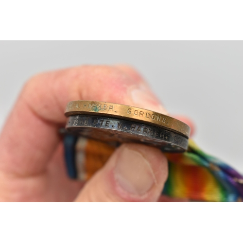 80 - THREE WORLD WAR ONE MEDALS, to include a service medal, and Victory medal both awarded to 'S-17230 P... 