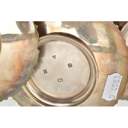 98 - A SELECTION OF THREE SILVER DISHES, each dish with geometric design border, approximate diameter of ... 