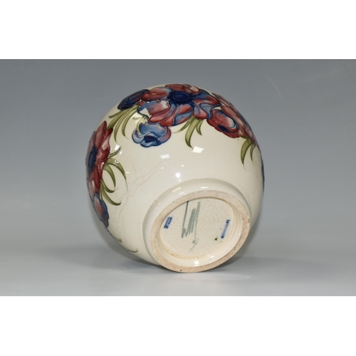 316 - A LARGE MOORCROFT POTTERY JARDINIERE, decorated  with purple and puce 'Anemone' design on a cream gr... 