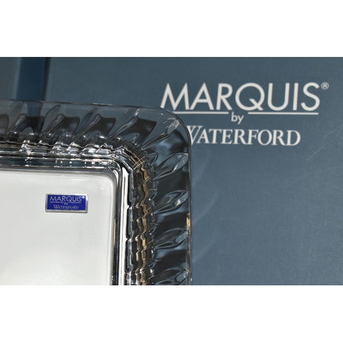 317 - TWO BOXED MARQUIS BY WATERFORD PHOTOGRAPH FRAMES, size 8 '' x 10 '' , both frames are unused with or... 