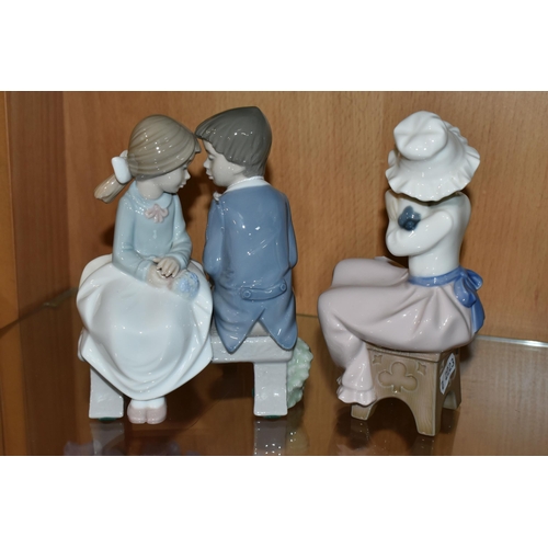 325 - TWO NAO FIGURES, comprising 1136 'First Love' and 1049 'A Big Girl Hug' (2) (Condition Report: both ... 