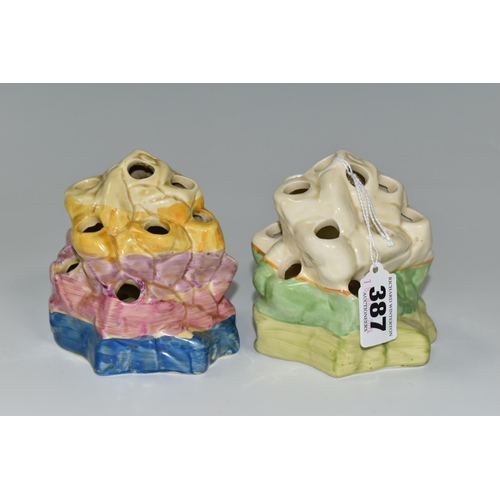 387 - TWO CLARICE CLIFF BIZARRE FLOWER/ROCK FROGS, shape 225 comprising, a blue, pink, purple and yellow b... 