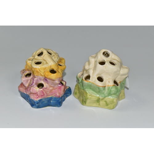 387 - TWO CLARICE CLIFF BIZARRE FLOWER/ROCK FROGS, shape 225 comprising, a blue, pink, purple and yellow b... 