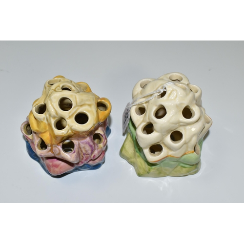 387 - TWO CLARICE CLIFF BIZARRE FLOWER/ROCK FROGS, shape 225 comprising, a blue, pink, purple and yellow b... 