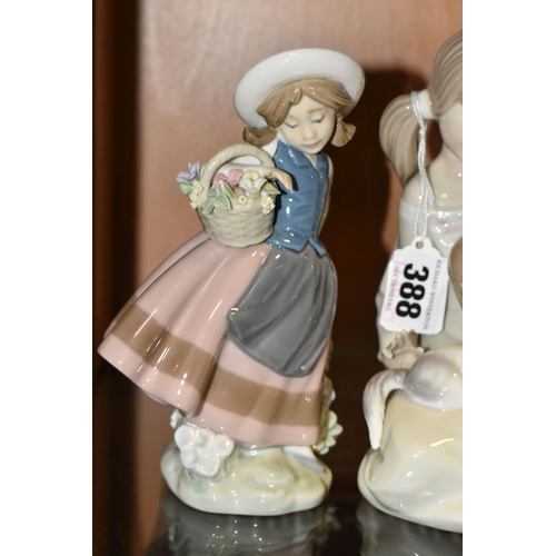 388 - A GROUP OF THREE LLADRO AND NAO FIGURES, comprising 1534 'Little Sister',  5221 'Sweetest Scent' des... 