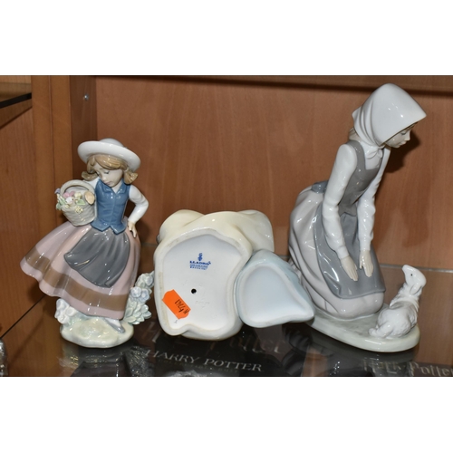 388 - A GROUP OF THREE LLADRO AND NAO FIGURES, comprising 1534 'Little Sister',  5221 'Sweetest Scent' des... 