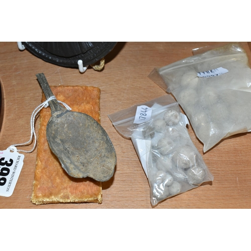 398 - TWO CANNON BALLS, A SMALL QUANTITY OF MUSKET BALLS, REPLICA SEALS, ETC, the cast iron cannon balls a... 